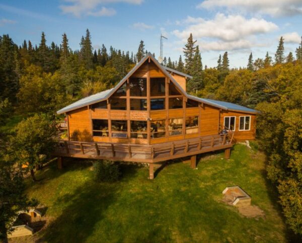 Aerial view of the lodge among the spruce
