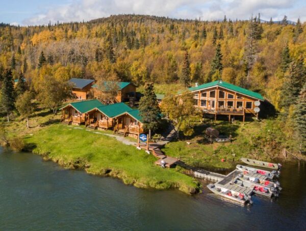 Aerial view of the riverside lodge and cabins in autumn